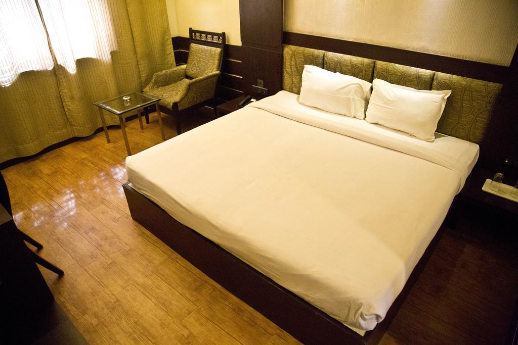 Hôtel The Rajshahi Palace à Indore Chambre photo